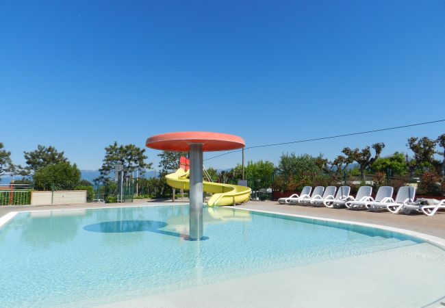  a Lazise - Regarda – casa vacanza Rosa Alba 7 con ingresso al campeggio Park delle Rose e alla spiaggia