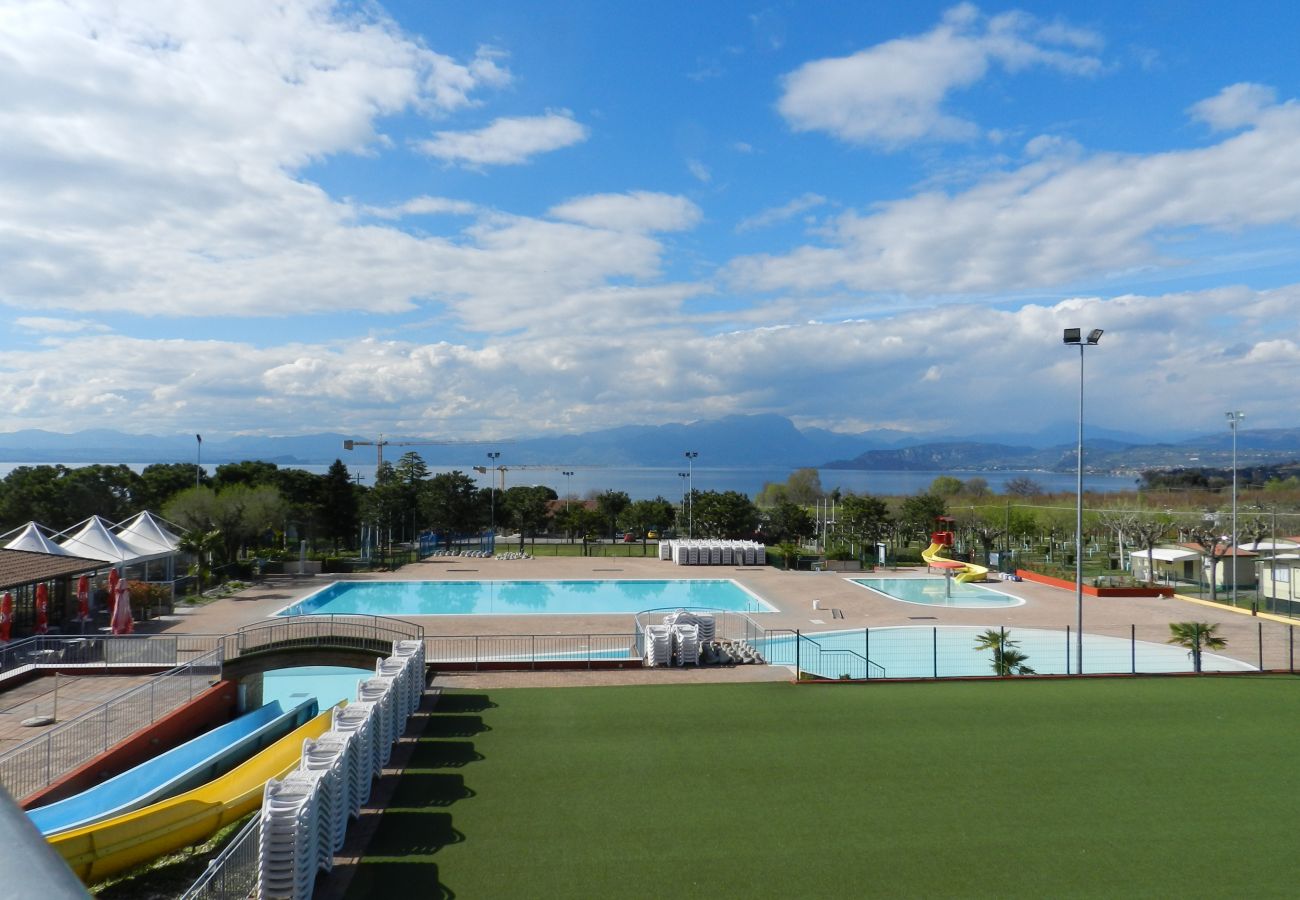 Appartamento a Lazise - Regarda – casa vacanza Rosa Alba 7 con ingresso al campeggio Park delle Rose e alla spiaggia