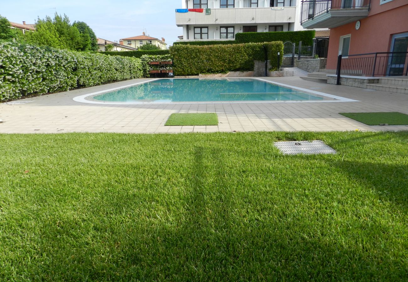 Appartamento a Lazise - Regarda - moderno trilocale Promenade a Lazise con giardino e piscina