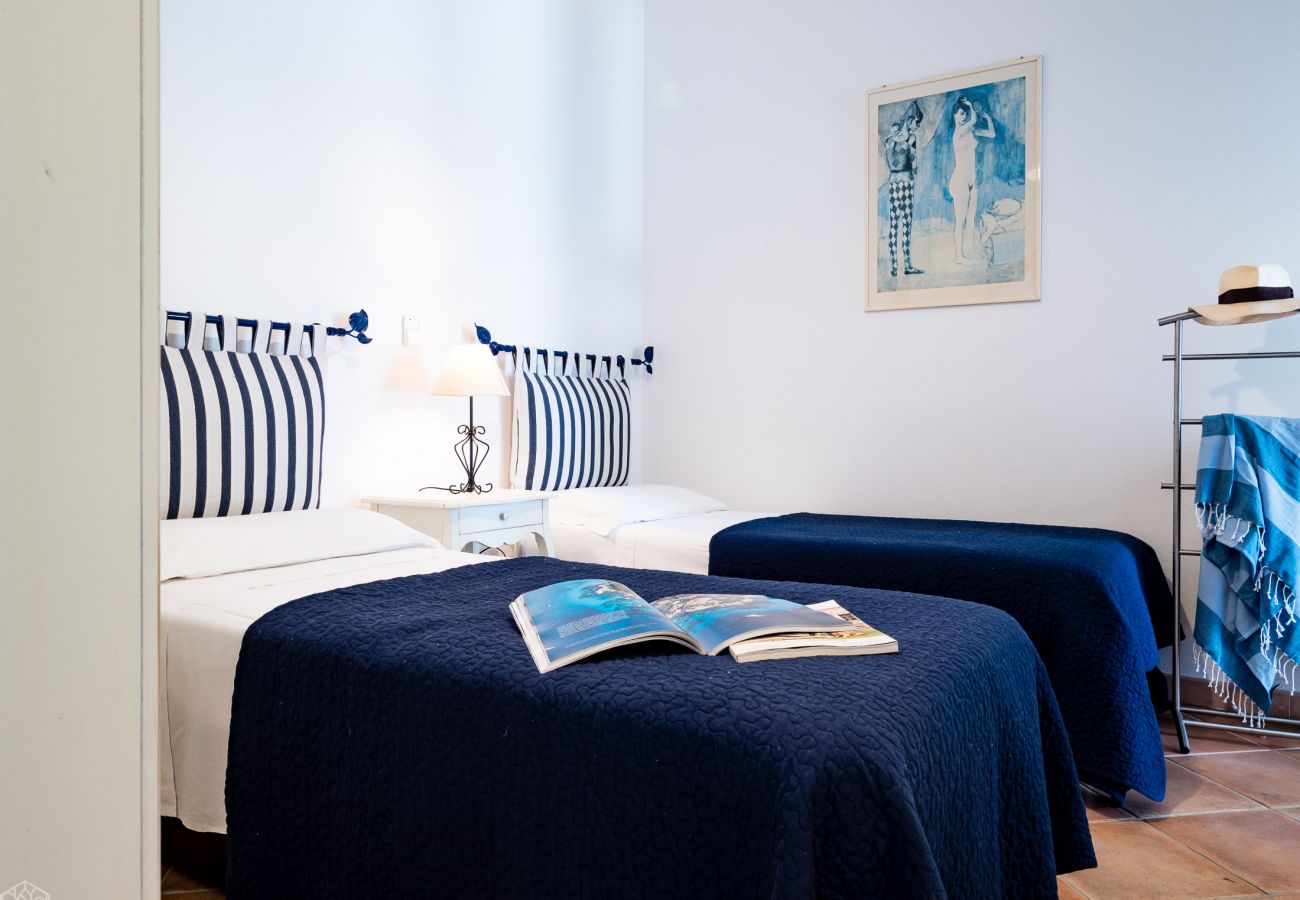 Villa Miriam - camera luminosa in villa in affitto, comfort e privacy per una casa vacanze a Pittulongu