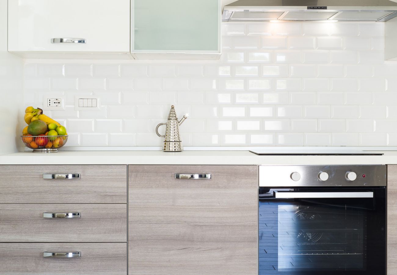 WLofts 13 - Cucina con elettrodomestici di alta qualità, perfetta per le tue vacanze in Sardegna