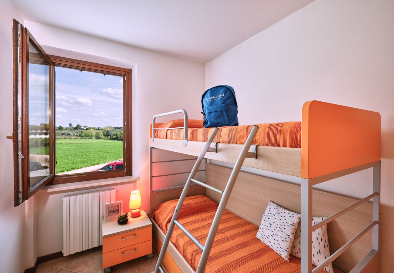 Appartamento a Lazise - Regarda - Bike apartment Miralago 2 con piscina e vista lago,  parcheggio biciclette