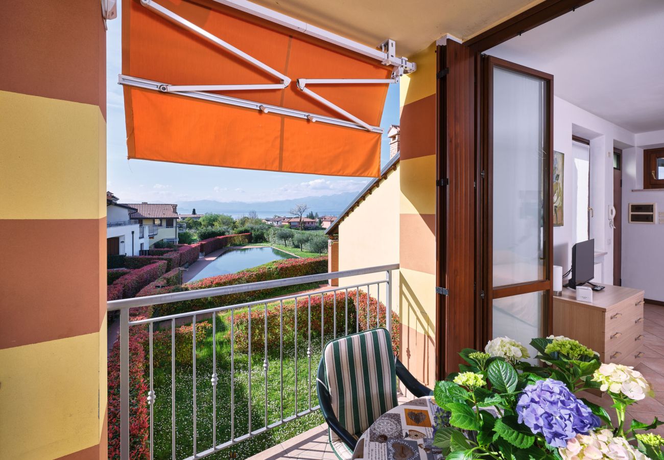 Appartamento a Lazise - Regarda - Bike apartment Miralago 2 con piscina e vista lago,  parcheggio biciclette