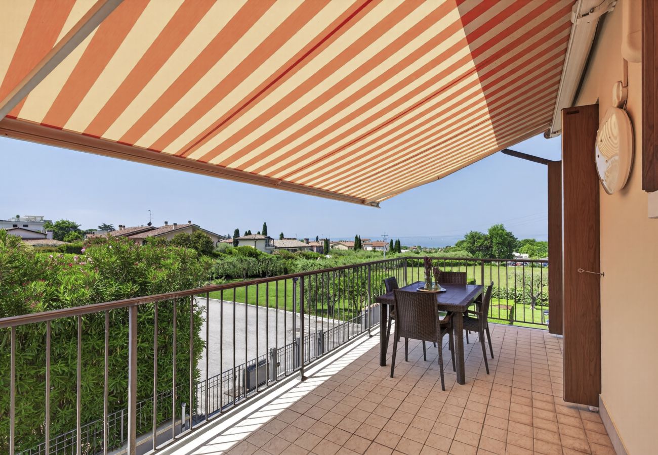 Ferienwohnung in Lazise - Regarda - Wohnung Blanco mit wunderschöner  Seeblick und Pool