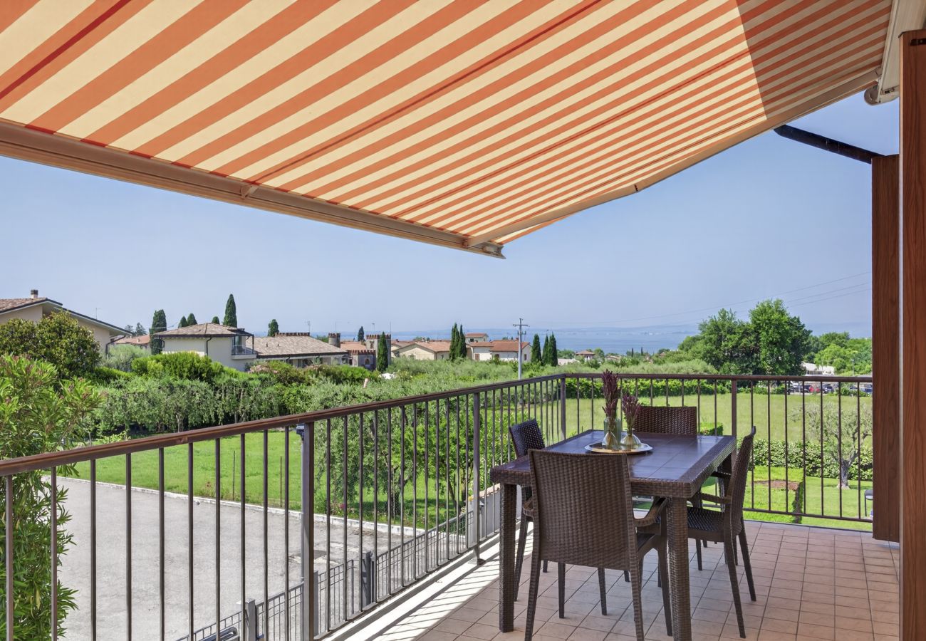 Ferienwohnung in Lazise - Regarda - Wohnung Blanco mit wunderschöner  Seeblick und Pool